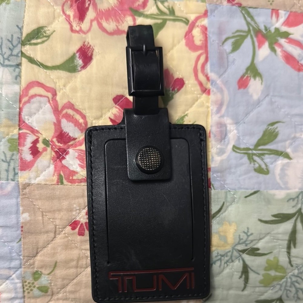 TUMI Black and Brown Luggage Tag
